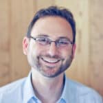 picture of andrew wilder smiling in a blue shirt